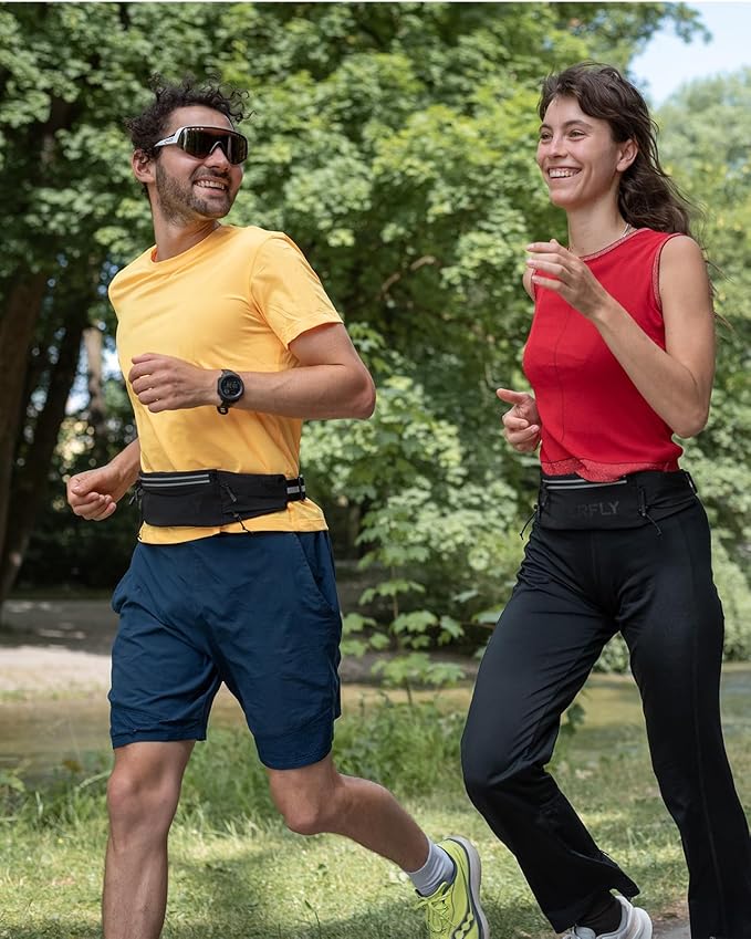 WATERFLY Running Belt Fanny Pack: Breathable 3 Pocket Waist Bag for Men Women Workout Exercise Fitness Phone Holder Fits All Phones - Runner Marathon Jogging Race Belt with Bib Clip Black