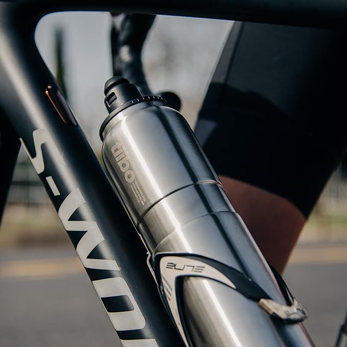 tiibo Vacuum Insulated Stainless Steel Bike Water Bottle, Double Wall, No-Squeeze, Fast Flow Sport Nozzle, Designed for Cycling, Biking, Fitness & Sports, Fits Most Bike Cages (Brushed, 23OZ)
